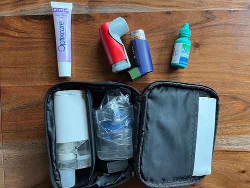 two inhalers, 1 container full with a nebulizer, and two kinds of eye drops
